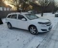 Белый Опель Астра, объемом двигателя 1.25 л и пробегом 220 тыс. км за 5300 $, фото 1 на Automoto.ua