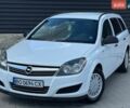 Белый Опель Астра, объемом двигателя 1.25 л и пробегом 300 тыс. км за 4300 $, фото 1 на Automoto.ua