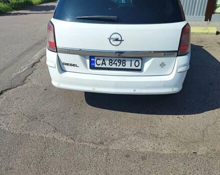 Белый Опель Астра, объемом двигателя 1.69 л и пробегом 320 тыс. км за 5800 $, фото 18 на Automoto.ua