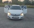 Белый Опель Астра, объемом двигателя 1.69 л и пробегом 260 тыс. км за 5900 $, фото 1 на Automoto.ua