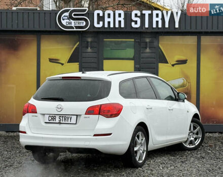 Белый Опель Астра, объемом двигателя 1.7 л и пробегом 300 тыс. км за 6999 $, фото 1 на Automoto.ua