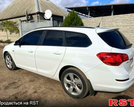 Опель Астра 2011 в Харькове на Automoto.ua Белый Опель Астра, объемом двигателя 1.7 л и пробегом 235 тыс. км за 7000 $, фото 3 на Automoto.ua