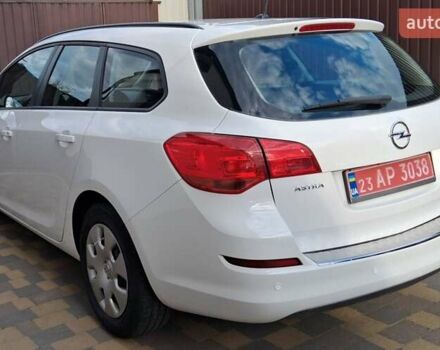 Білий Опель Астра, об'ємом двигуна 1.3 л та пробігом 170 тис. км за 7100 $, фото 2 на Automoto.ua