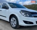 Белый Опель Астра, объемом двигателя 1.69 л и пробегом 245 тыс. км за 4950 $, фото 1 на Automoto.ua