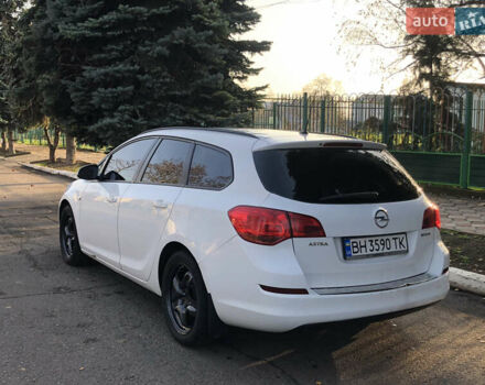 Белый Опель Астра, объемом двигателя 1.25 л и пробегом 321 тыс. км за 7499 $, фото 3 на Automoto.ua