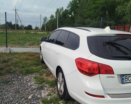 Белый Опель Астра, объемом двигателя 1.25 л и пробегом 280 тыс. км за 5500 $, фото 3 на Automoto.ua