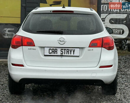 Белый Опель Астра, объемом двигателя 1.7 л и пробегом 300 тыс. км за 6999 $, фото 14 на Automoto.ua