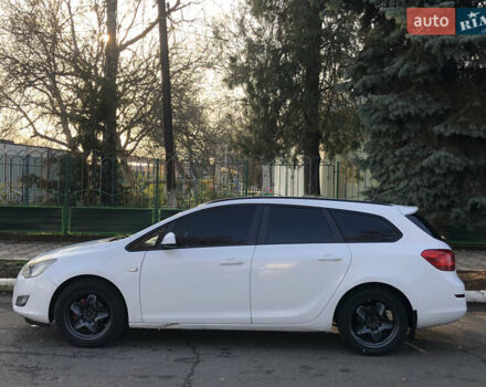 Белый Опель Астра, объемом двигателя 1.25 л и пробегом 321 тыс. км за 7499 $, фото 2 на Automoto.ua