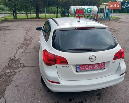 Опель Астра 2012 в Стрые на Automoto.ua Белый Опель Астра, объемом двигателя 1.7 л и пробегом 198 тыс. км за 7350 $, фото 11 на Automoto.ua