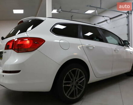 Білий Опель Астра, об'ємом двигуна 1.7 л та пробігом 144 тис. км за 8899 $, фото 22 на Automoto.ua