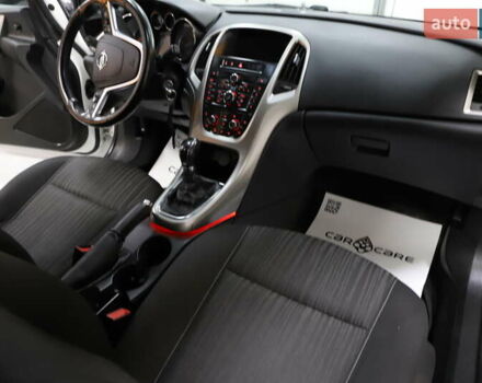 Білий Опель Астра, об'ємом двигуна 1.7 л та пробігом 144 тис. км за 8899 $, фото 61 на Automoto.ua