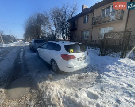 Белый Опель Астра, объемом двигателя 1.25 л и пробегом 255 тыс. км за 5800 $, фото 2 на Automoto.ua