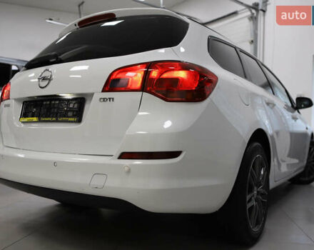 Белый Опель Астра, объемом двигателя 1.7 л и пробегом 140 тыс. км за 7700 $, фото 39 на Automoto.ua