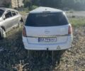 Білий Опель Астра, об'ємом двигуна 1.6 л та пробігом 150 тис. км за 1602 $, фото 2 на Automoto.ua