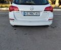 Білий Опель Астра, об'ємом двигуна 1.25 л та пробігом 250 тис. км за 6650 $, фото 2 на Automoto.ua