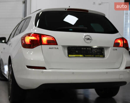 Белый Опель Астра, объемом двигателя 1.7 л и пробегом 140 тыс. км за 7700 $, фото 4 на Automoto.ua