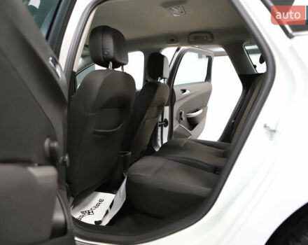 Белый Опель Астра, объемом двигателя 1.7 л и пробегом 140 тыс. км за 7700 $, фото 70 на Automoto.ua