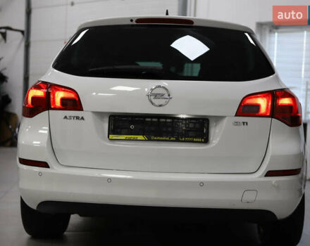 Белый Опель Астра, объемом двигателя 1.7 л и пробегом 140 тыс. км за 7700 $, фото 34 на Automoto.ua