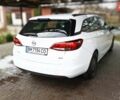 Белый Опель Астра, объемом двигателя 1.6 л и пробегом 166 тыс. км за 11000 $, фото 6 на Automoto.ua