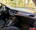 Белый Опель Астра, объемом двигателя 1.5 л и пробегом 165 тыс. км за 10950 $, фото 6 на Automoto.ua