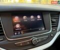 Білий Опель Астра, об'ємом двигуна 1.5 л та пробігом 165 тис. км за 11750 $, фото 25 на Automoto.ua