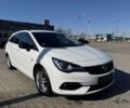 Белый Опель Астра, объемом двигателя 1.5 л и пробегом 164 тыс. км за 9200 $, фото 1 на Automoto.ua