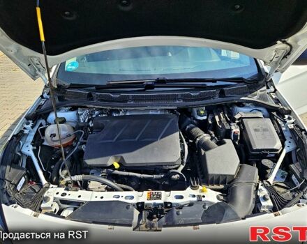 Белый Опель Астра, объемом двигателя 1.5 л и пробегом 100 тыс. км за 14500 $, фото 5 на Automoto.ua