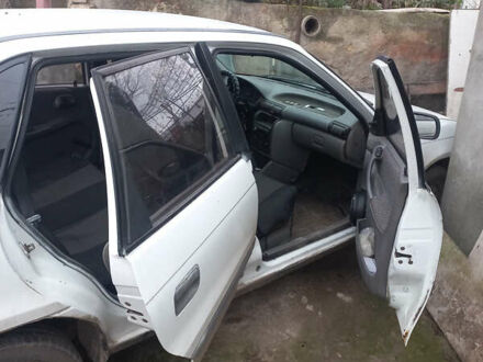 Белый Опель Астра, объемом двигателя 1.4 л и пробегом 559 тыс. км за 1700 $, фото 1 на Automoto.ua