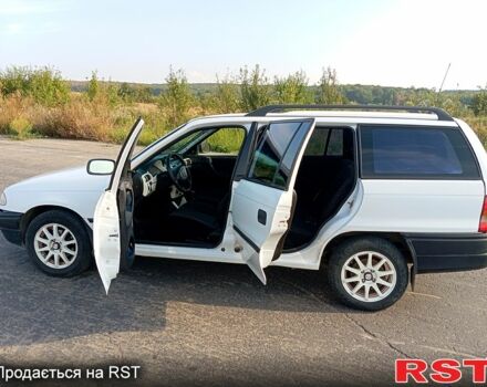 Білий Опель Астра, об'ємом двигуна 1.8 л та пробігом 300 тис. км за 1800 $, фото 1 на Automoto.ua