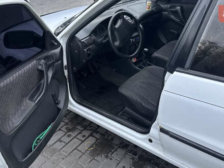 Білий Опель Астра, об'ємом двигуна 1.36 л та пробігом 330 тис. км за 1000 $, фото 1 на Automoto.ua