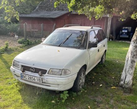 Белый Опель Астра, объемом двигателя 1.4 л и пробегом 400 тыс. км за 1005 $, фото 1 на Automoto.ua