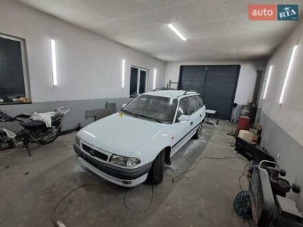 Білий Опель Астра, об'ємом двигуна 1.4 л та пробігом 240 тис. км за 1450 $, фото 1 на Automoto.ua