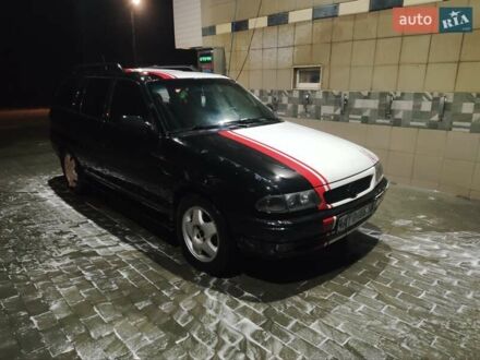 Білий Опель Астра, об'ємом двигуна 1.6 л та пробігом 440 тис. км за 1650 $, фото 1 на Automoto.ua