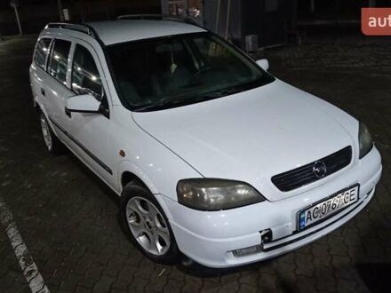 Белый Опель Астра, объемом двигателя 2 л и пробегом 230 тыс. км за 1700 $, фото 1 на Automoto.ua