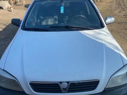 Белый Опель Астра, объемом двигателя 1.7 л и пробегом 385 тыс. км за 1599 $, фото 1 на Automoto.ua