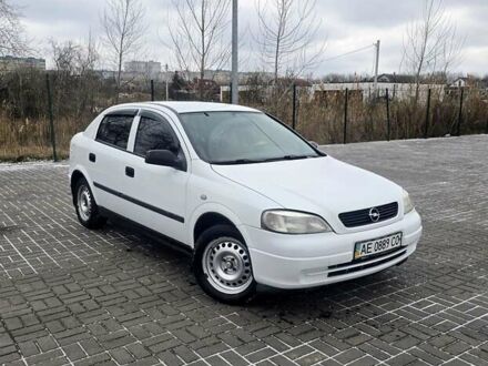 Белый Опель Астра, объемом двигателя 1.2 л и пробегом 263 тыс. км за 2999 $, фото 1 на Automoto.ua