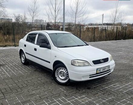 Белый Опель Астра, объемом двигателя 1.2 л и пробегом 263 тыс. км за 2999 $, фото 1 на Automoto.ua