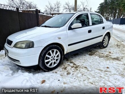 Белый Опель Астра, объемом двигателя 1.4 л и пробегом 370 тыс. км за 2400 $, фото 1 на Automoto.ua