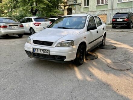 Білий Опель Астра, об'ємом двигуна 1.2 л та пробігом 100 тис. км за 1208 $, фото 1 на Automoto.ua