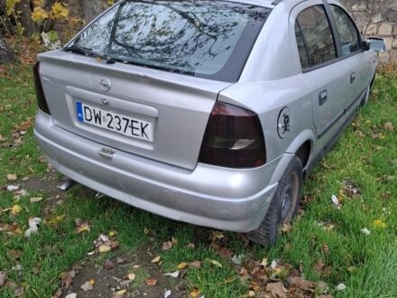 Белый Опель Астра, объемом двигателя 1.6 л и пробегом 242 тыс. км за 800 $, фото 1 на Automoto.ua