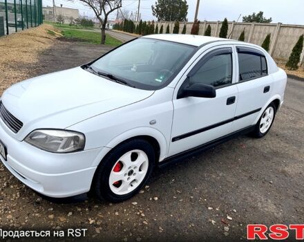 Белый Опель Астра, объемом двигателя 2 л и пробегом 239 тыс. км за 3499 $, фото 1 на Automoto.ua