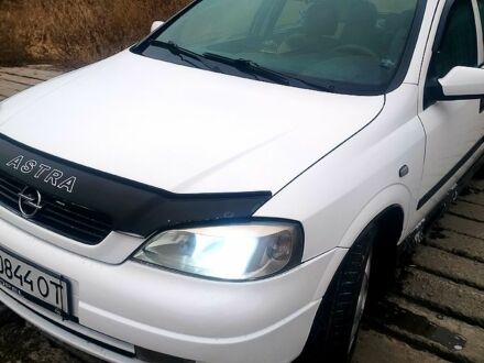 Белый Опель Астра, объемом двигателя 1.4 л и пробегом 180 тыс. км за 3800 $, фото 1 на Automoto.ua