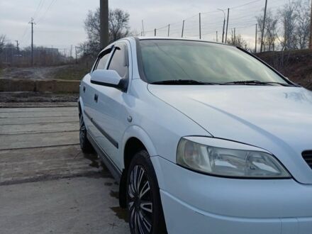 Белый Опель Астра, объемом двигателя 1.4 л и пробегом 233 тыс. км за 4000 $, фото 1 на Automoto.ua