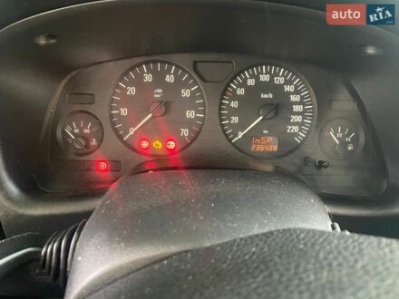 Белый Опель Астра, объемом двигателя 1.39 л и пробегом 235 тыс. км за 1800 $, фото 1 на Automoto.ua