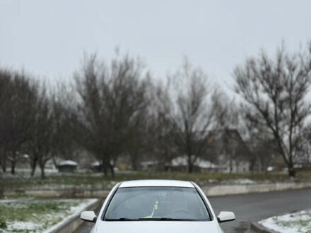 Белый Опель Астра, объемом двигателя 1.39 л и пробегом 340 тыс. км за 3650 $, фото 1 на Automoto.ua