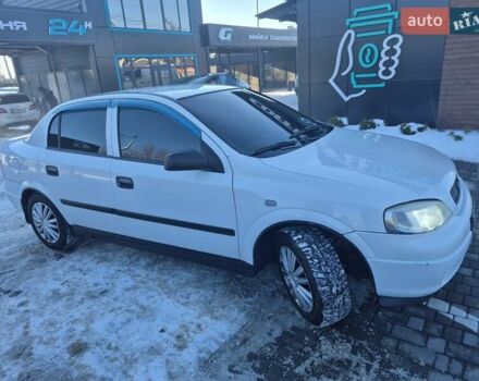 Белый Опель Астра, объемом двигателя 1.4 л и пробегом 224 тыс. км за 3650 $, фото 1 на Automoto.ua