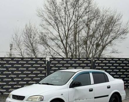 Белый Опель Астра, объемом двигателя 1.4 л и пробегом 221 тыс. км за 1700 $, фото 1 на Automoto.ua