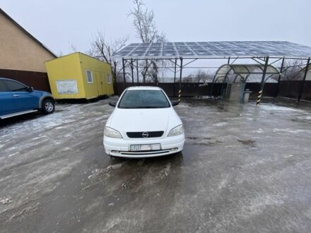 Білий Опель Астра, об'ємом двигуна 1.4 л та пробігом 240 тис. км за 2399 $, фото 1 на Automoto.ua