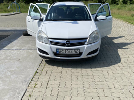 Білий Опель Астра, об'ємом двигуна 1.25 л та пробігом 250 тис. км за 5250 $, фото 1 на Automoto.ua