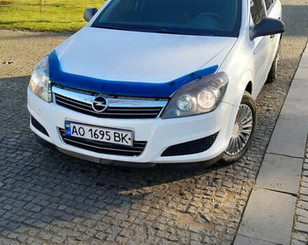 Белый Опель Астра, объемом двигателя 1.25 л и пробегом 410 тыс. км за 6500 $, фото 1 на Automoto.ua